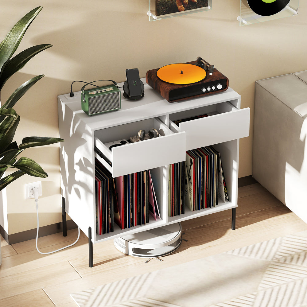 Record player stand in white with two drawers and open compartments for vinyl record storage and cable management.
