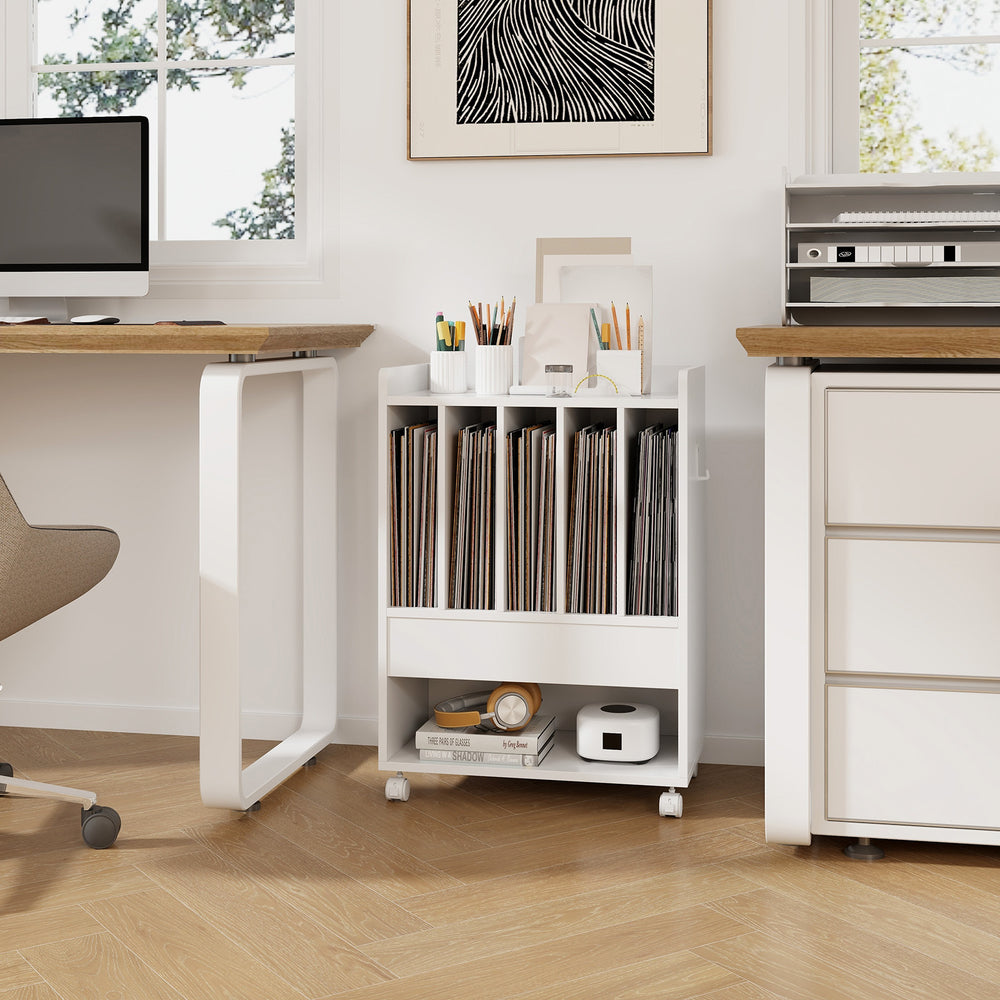 Vinyl record holder with dividers and drawer, white finish, on wheels for easy mobility and organization in a home.