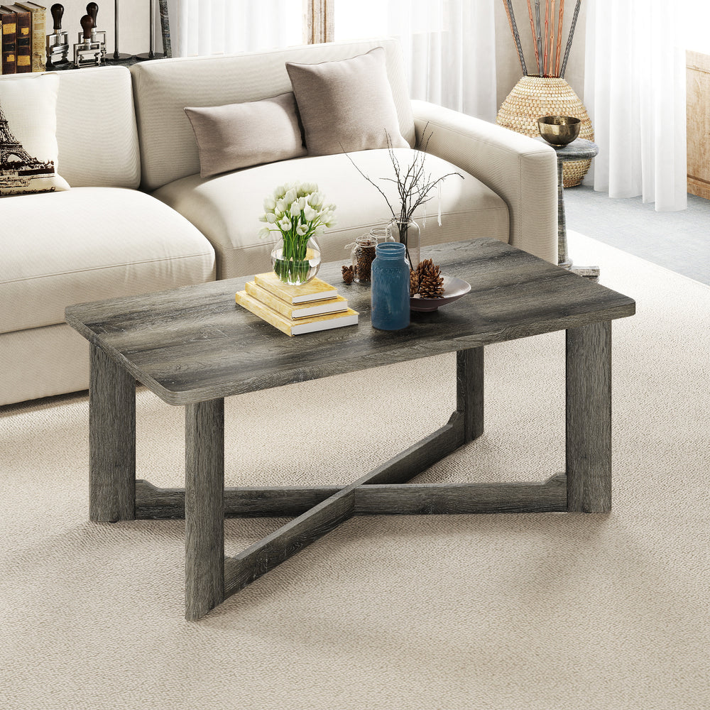Rectangle coffee table with gray rubber wood base and X-shaped design, featuring a spacious tabletop for decor and.