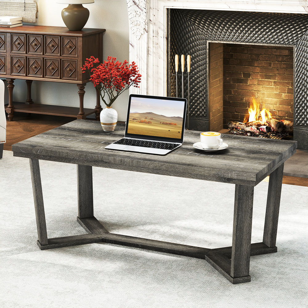 Rectangle coffee table with gray rubber wood base and cross-shaped design, ideal for stylish living room setups.
