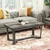 Rectangle coffee table showcasing a cross-shaped gray rubber wood base, perfect for enhancing living room decor.