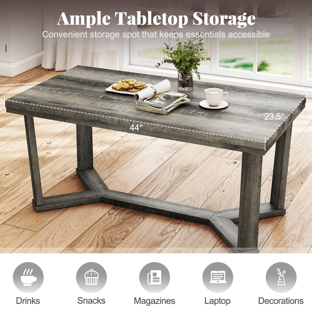 Rectangle coffee table with gray rubber wood base, featuring ample storage and a cross-shaped design for stability.