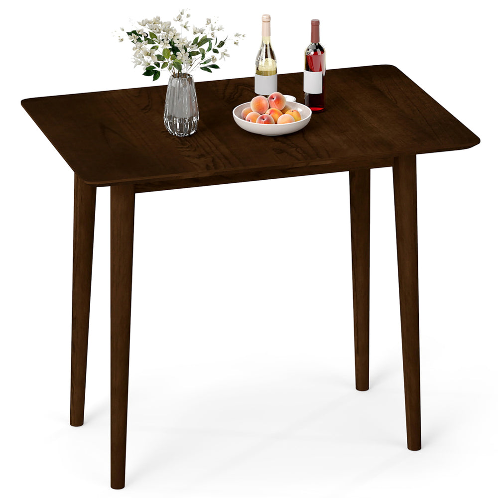 Rectangular walnut dining table for 2-4 with solid rubber wood legs, featuring a rustic finish and compact design.