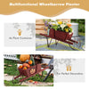 Wooden wagon planter in red with flowers, made of solid pine wood, perfect for garden decoration and holiday displays.