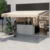 Retractable patio awning in beige, showcasing a modern design over a café setting, perfect for sunshade on decks.