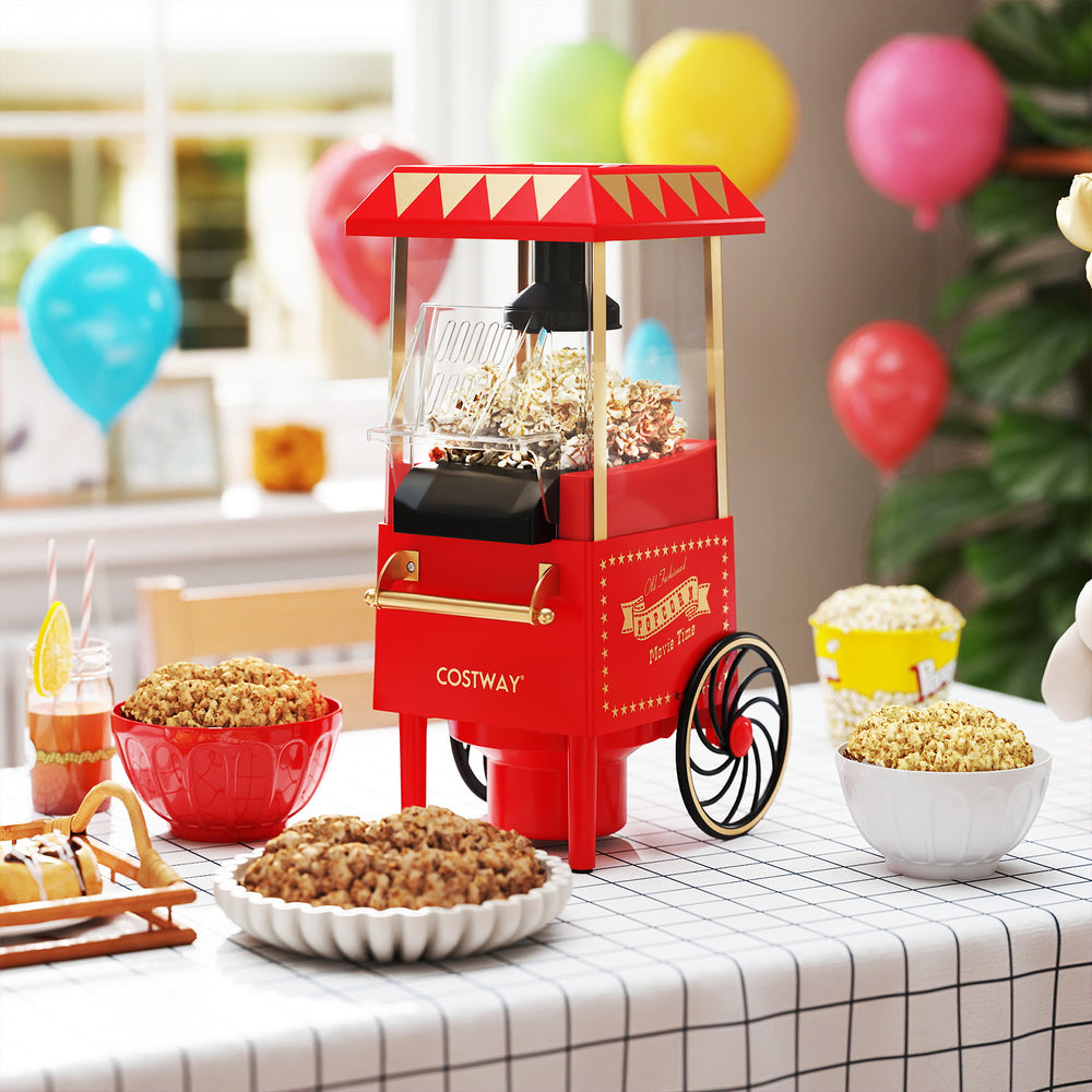 Retro hot air popcorn maker in red, 1200W, with measuring cup, perfect for healthy popcorn at family gatherings.