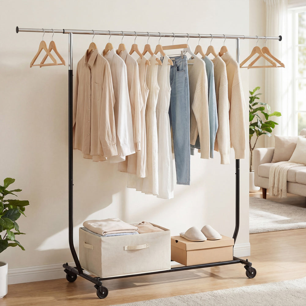 Rolling clothes rack with extendable top rod, featuring storage bins below, ideal for laundry or bedroom use.