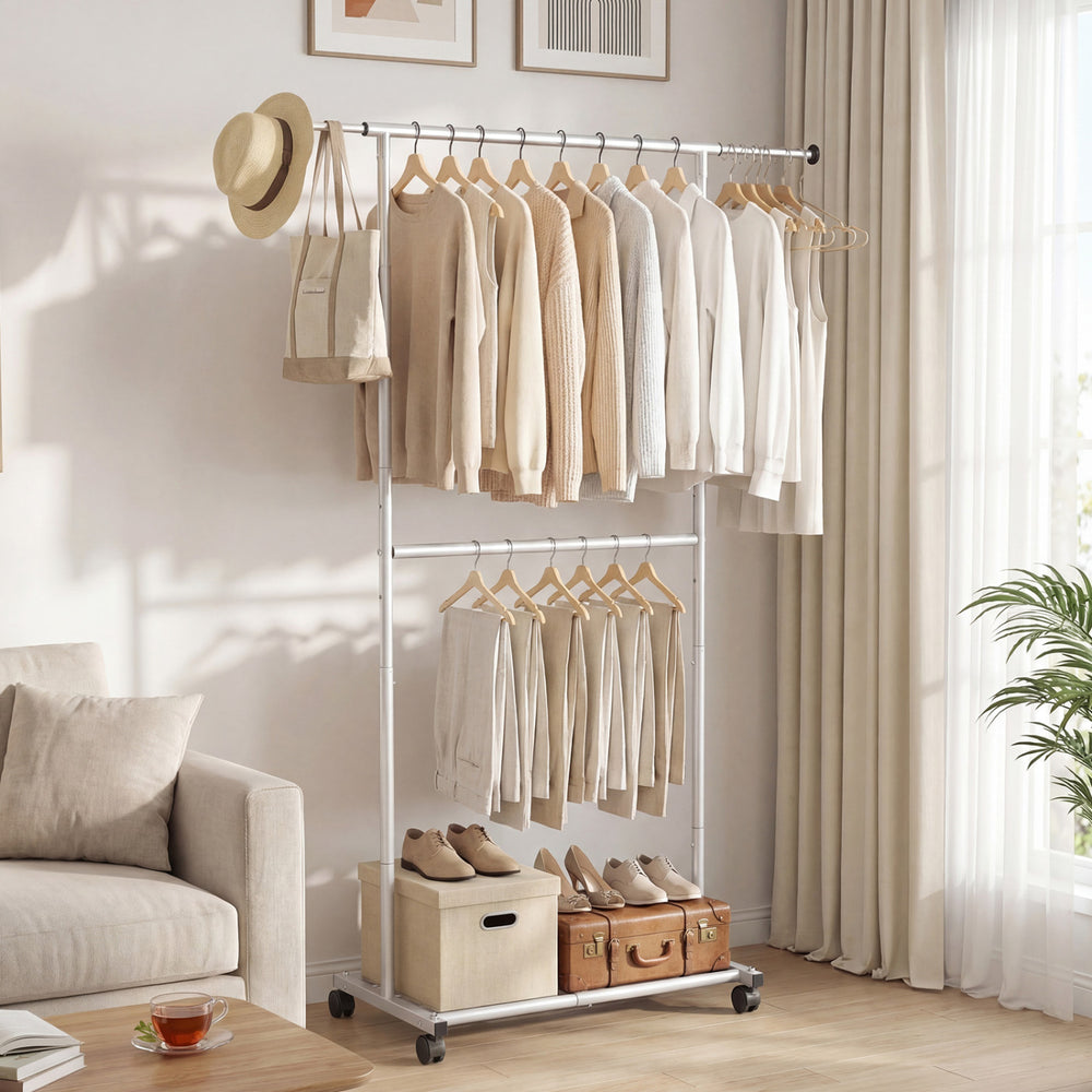 Double-rod rolling clothes rack with extendable top rod, adjustable height, and extra storage for versatile use.