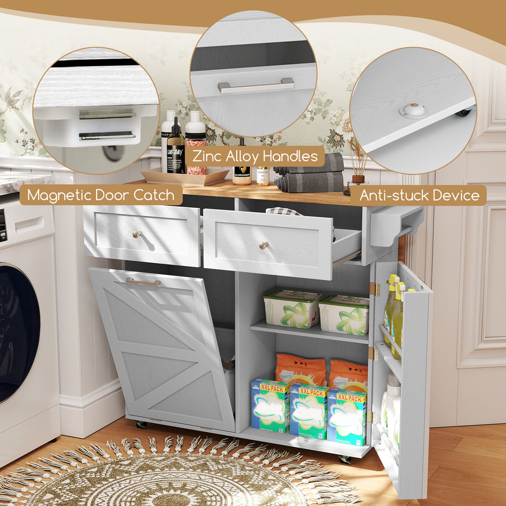 Rolling kitchen island in grey featuring a drop leaf top, storage drawers, and rubber wheels for easy mobility.