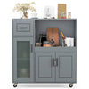 Side view of the gray rolling kitchen island with frosted glass door, showcasing its spacious countertop and organized.