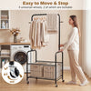 Rolling metal clothes rack with hanging rod and storage basket, featuring 4 wheels for easy movement and stability.