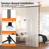 Adjustable black room divider curtain rod with concealed spring lock, no drilling, for versatile floor-to-ceiling use.