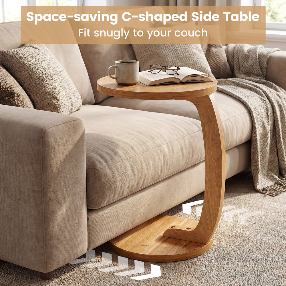 C-shaped side table in solid teak wood with a thickened top, fitting snugly to your couch for easy access to essentials.