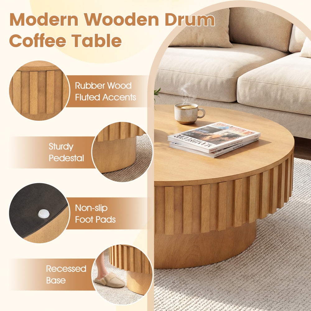 Modern wooden drum coffee table with fluted accents, hidden storage, and sturdy pedestal for living room organization.