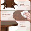 Round dining table with a walnut finish, featuring a stable pedestal base and easy-to-clean waterproof surface for 4-6.