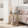 Round end table with tempered glass top and faux marble base, featuring a gold metal frame for modern bedroom decor.