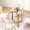 Round 42-inch glass dining table with natural rubber wood legs, suitable for dining and gatherings.