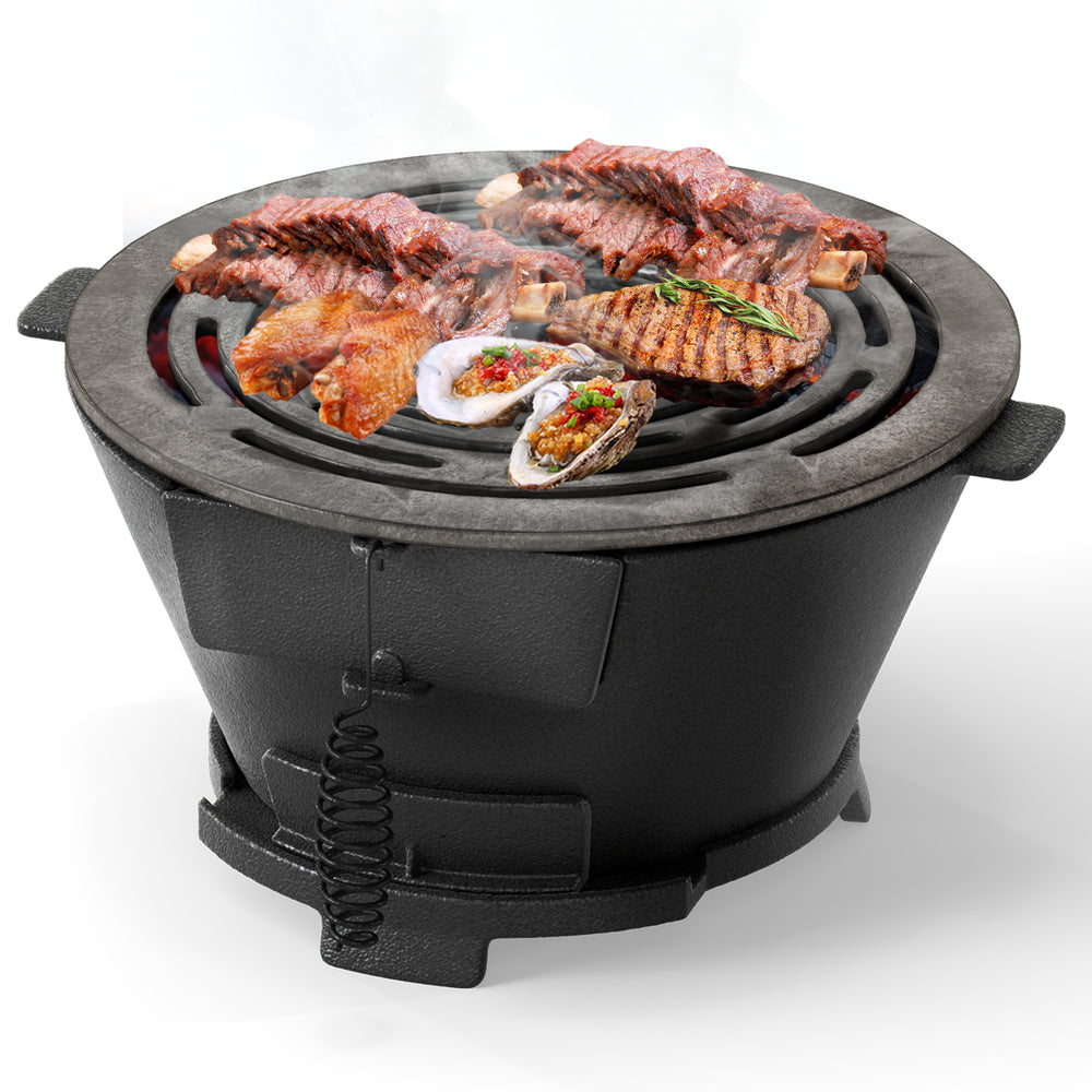 Round hibachi grill with 12-inch double-sided grate, made of heat-resistant cast iron, perfect for outdoor grilling.