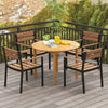 Round outdoor dining table made of acacia wood, seating 4, perfect for garden or patio gatherings.