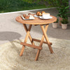Round patio folding coffee table made of teak wood, featuring a slatted tabletop, perfect for outdoor picnics and.