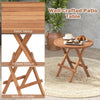 Round patio folding coffee table made of premium teak wood with slatted tabletop, ideal for picnics and camping.