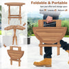 Round patio folding coffee table made of teak wood, featuring a slatted tabletop and portable design for easy carrying.