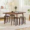 Round portable wood nesting stools in walnut finish, featuring lockable casters for easy mobility and space-saving.