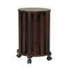Round portable wood nesting stool in walnut with a smooth surface and sturdy rubber wood legs, perfect for small spaces.
