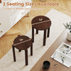 Round portable wood nesting stools in walnut finish, featuring two sizes and lockable casters for easy mobility and.