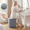 Round gray storage ottoman with removable lid, soft chenille fabric, and acacia wood frame for versatile use.