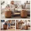 Round storage ottoman in brown faux leather with acacia wood frame, serving as a footstool and side table for versatile.