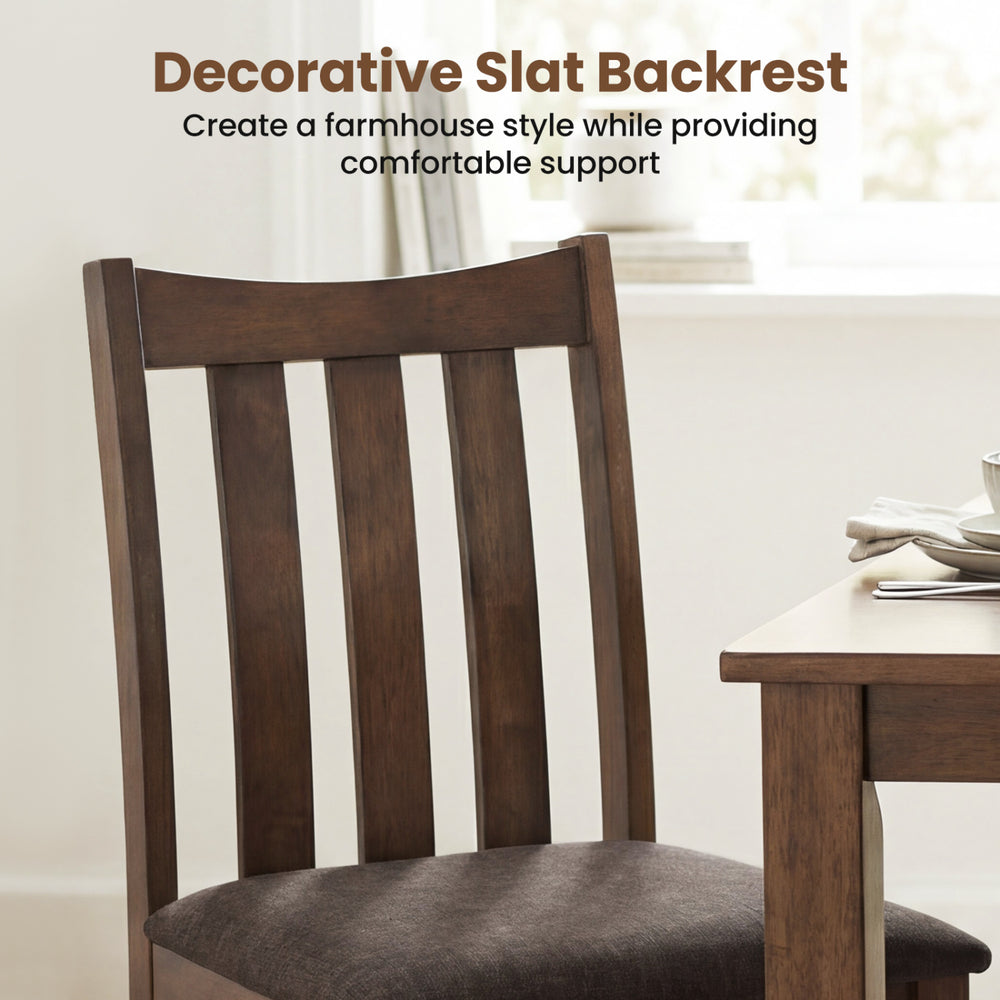 Brown rubber wood dining chair with decorative slat backrest, offering comfortable support for farmhouse-style dining.