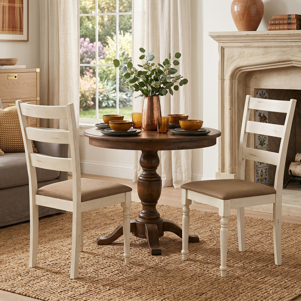 White rubber wood dining chairs with padded linen seats and slatted backrests, perfect for dining or living room use.