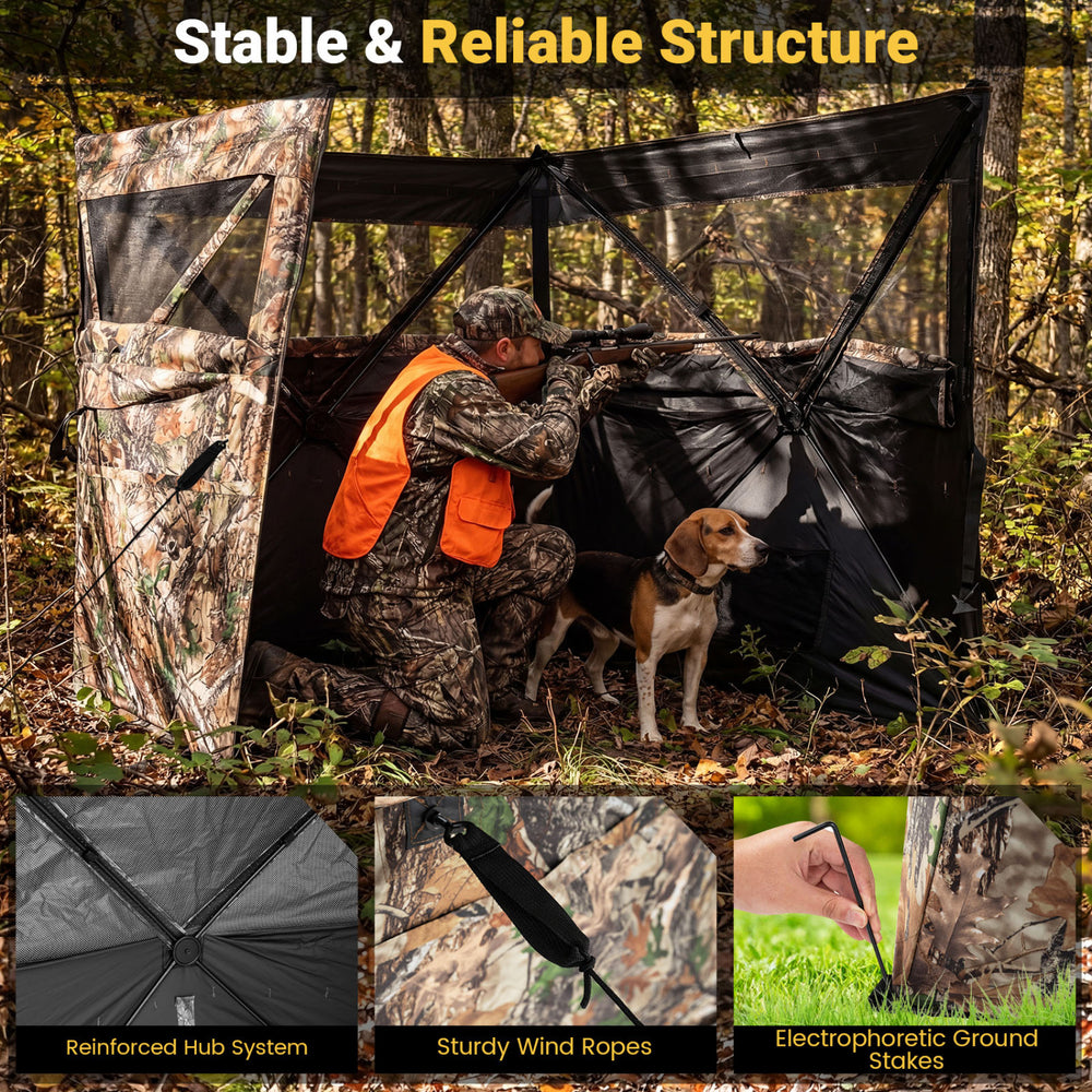 Pop-up hunting blind with camouflage pattern, featuring adjustable windows and dog doors for 1-3 people in a forest.