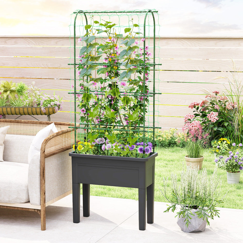 Self-watering raised garden bed in black with climbing trellis, ideal for growing flowers and vegetables in an elevated.