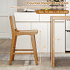 Counter height bar stool with teak wood frame and woven paper rope, designed for outdoor comfort and style.