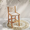 Outdoor counter height bar stool with teak wood frame and woven paper rope, perfect for patios and outdoor bars.