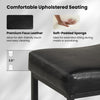 Black faux leather upholstered seat of a 25-inch counter height bar chair, ideal for kitchen islands and dining.