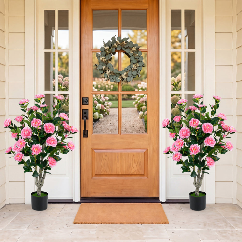 Set of 2 artificial camellia trees with vibrant pink flowers in cement pots, perfect for outdoor decoration by the door.