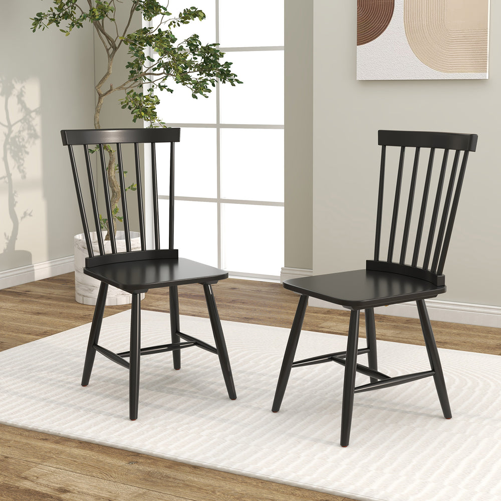 Set of 2 black Windsor dining chairs with high spindle back, featuring sturdy rubber wood frame for stylish dining.