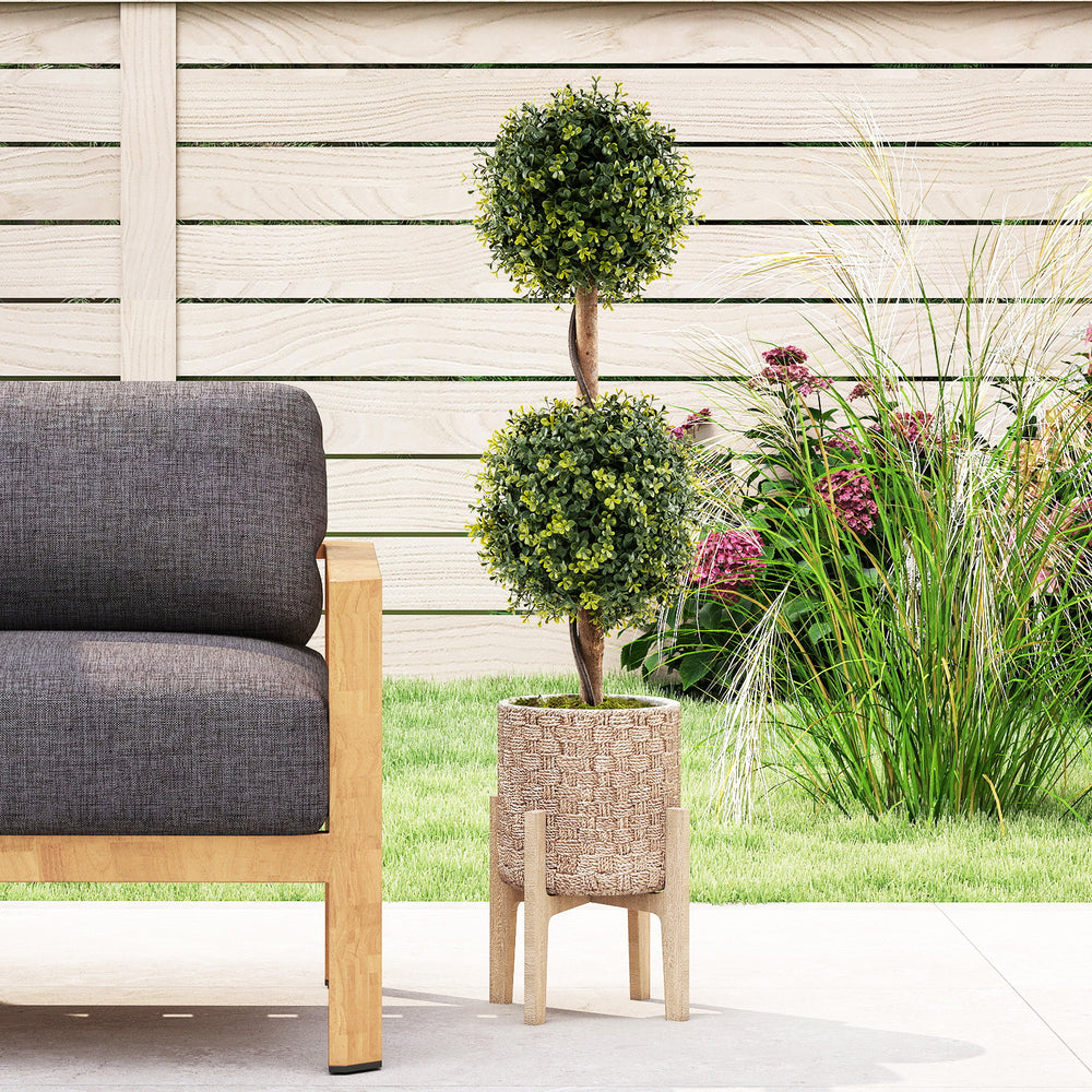Artificial double topiary ball trees with vivid leaves in a cement-filled pot, perfect for outdoor decoration.