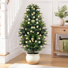 Artificial topiary tree with white blossoms in a weighted pot, perfect for home corners or wedding decorations.