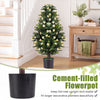 Set of 2 artificial topiary trees with white blossoms in cement-filled pots, ideal for home decor and maintenance-free greenery.
