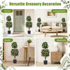 Set of 2 artificial topiary trees with white blossoms, perfect for versatile home decor in living rooms or porches.