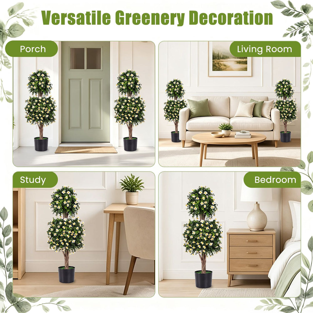 Set of 2 artificial topiary trees with white blossoms, perfect for versatile home decor in living rooms or porches.