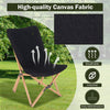 Black folding bamboo dorm chair featuring breathable canvas fabric and storage pocket, ideal for camping and fishing.