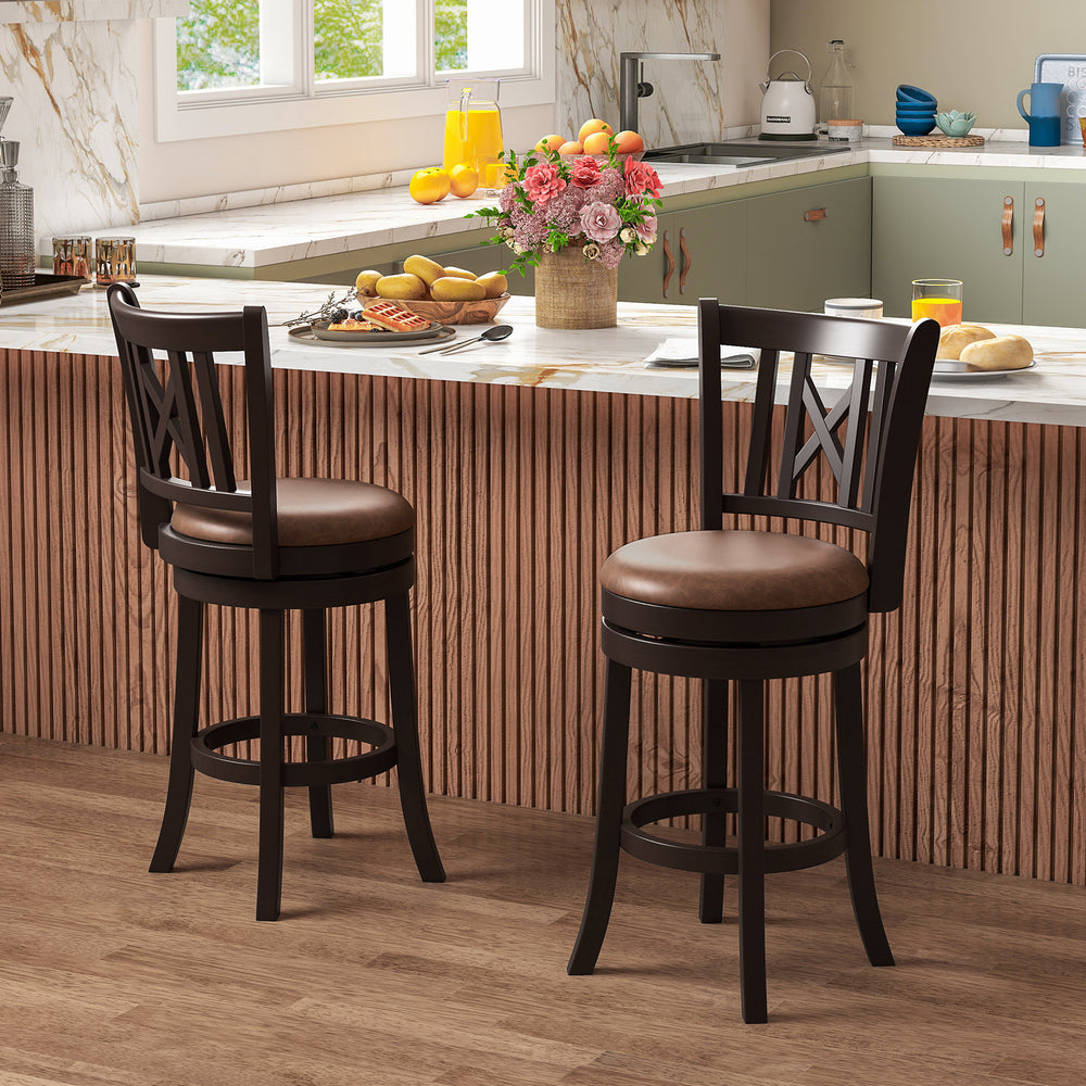 Set of 2 swivel bar stools with brown leathaire upholstery and rubber wood frame, perfect for kitchen or dining areas.