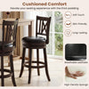 Set of 2 swivel bar stools with breathable leathaire upholstery and ergonomic footrest for enhanced comfort and stability.