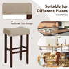 Beige upholstered bar stool with nailhead trim, solid rubber wood legs, ideal for kitchen or dining room use.