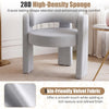 Gray velvet barrel accent chair featuring a curved backrest and thick cushion for enhanced comfort and stylish support.